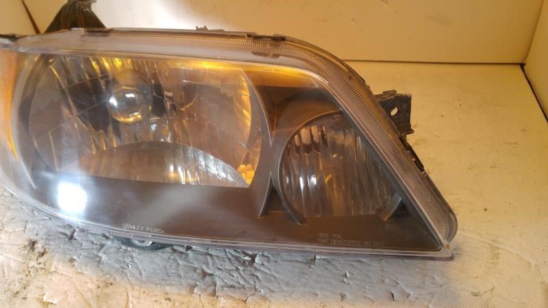 Right headlamp assembly composite used genuine OEM Mazda Protege 2001-2003