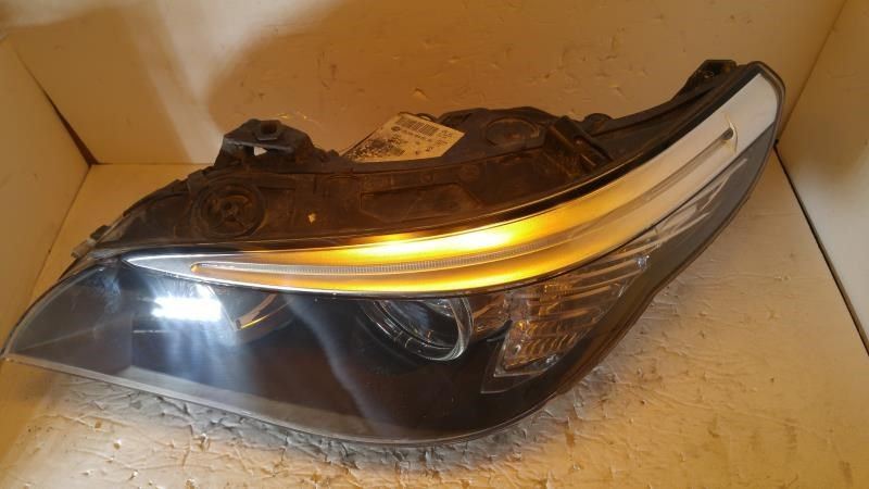 Left headlamp lens/housing used genuine OEM BMW 528I 2008-2010