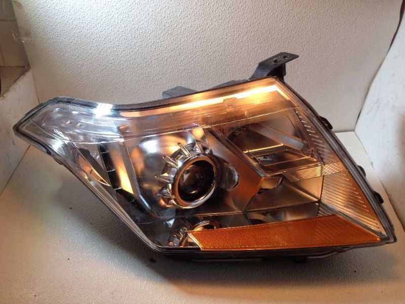 Left headlamp assembly composite used genuine OEM Cadillac SRX 2010-2013