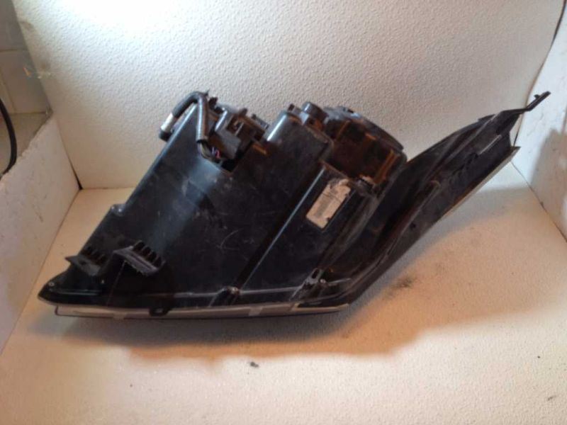 Left headlamp assembly composite used genuine OEM Cadillac SRX 2010-2013