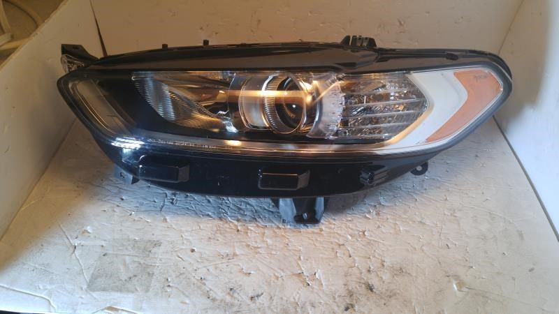 Left headlamp assembly composite used genuine OEM Ford Fusion 2013-2016