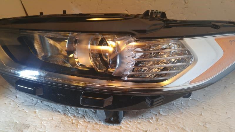Left headlamp assembly composite used genuine OEM Ford Fusion 2013-2016