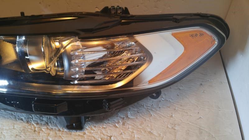 Left headlamp assembly composite used genuine OEM Ford Fusion 2013-2016