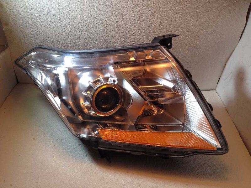 Left headlamp assembly composite used genuine OEM Cadillac SRX 2010-2013