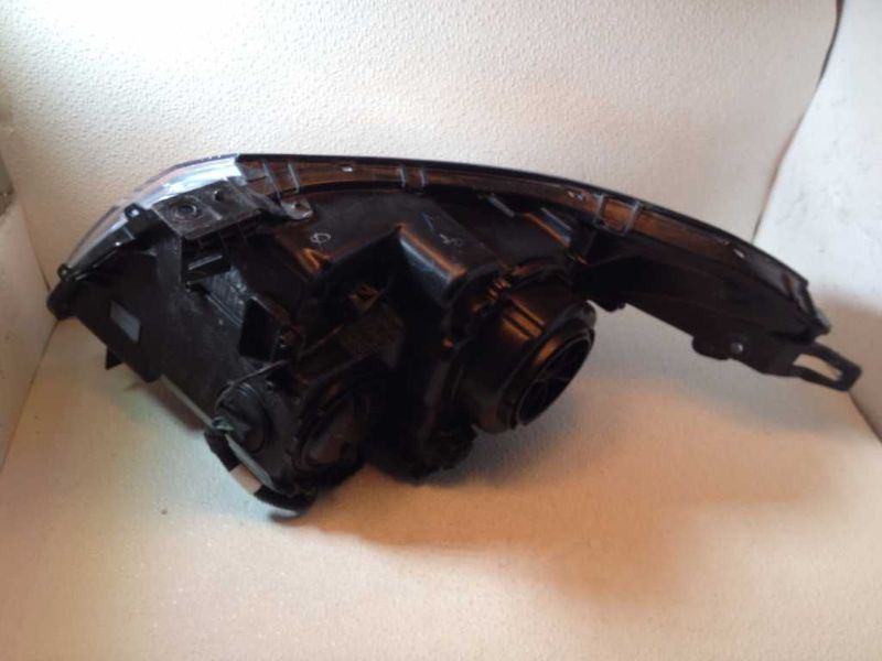Left headlamp assembly composite used genuine OEM Cadillac SRX 2010-2013