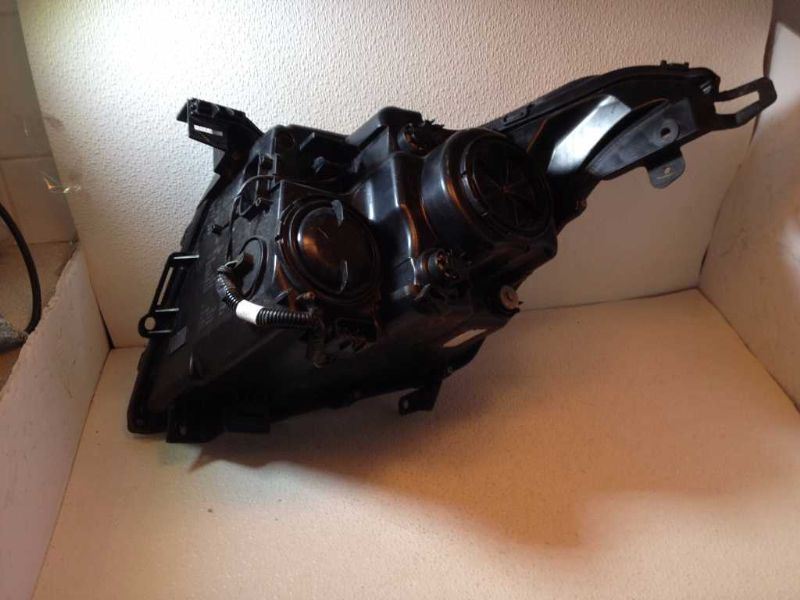 Left headlamp assembly composite used genuine OEM Cadillac SRX 2010-2013