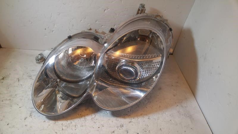 Left headlamp assembly composite used genuine OEM Mercedes-Benz SL55 AMG 2003-2008