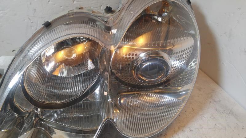 Left headlamp assembly composite used genuine OEM Mercedes-Benz SL55 AMG 2003-2008