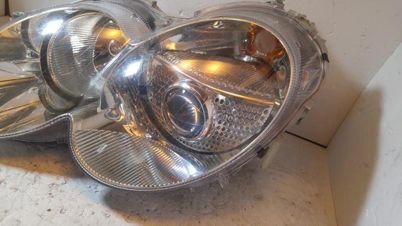 Left headlamp assembly composite used genuine OEM Mercedes-Benz SL55 AMG 2003-2008