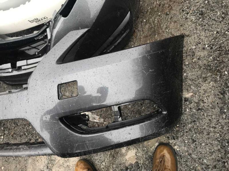 Front bumper cover used genuine OEM Nissan Sentra 2013-2015