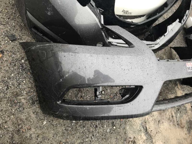 Front bumper cover used genuine OEM Nissan Sentra 2013-2015