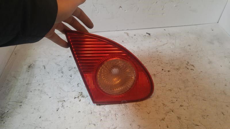 Left back up lamp assembly used genuine OEM Toyota Corolla 2003-2008