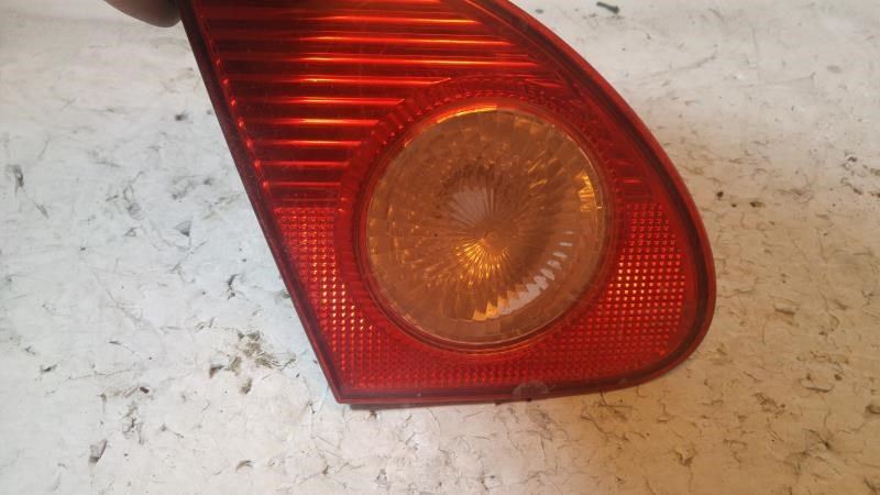 Left back up lamp assembly used genuine OEM Toyota Corolla 2003-2008