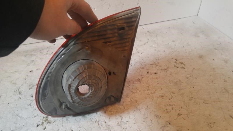 Left back up lamp assembly used genuine OEM Toyota Corolla 2003-2008