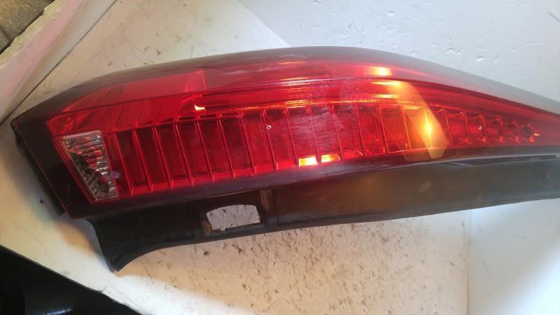 Left taillamp assembly used genuine OEM Cadillac CTS 2010-2014