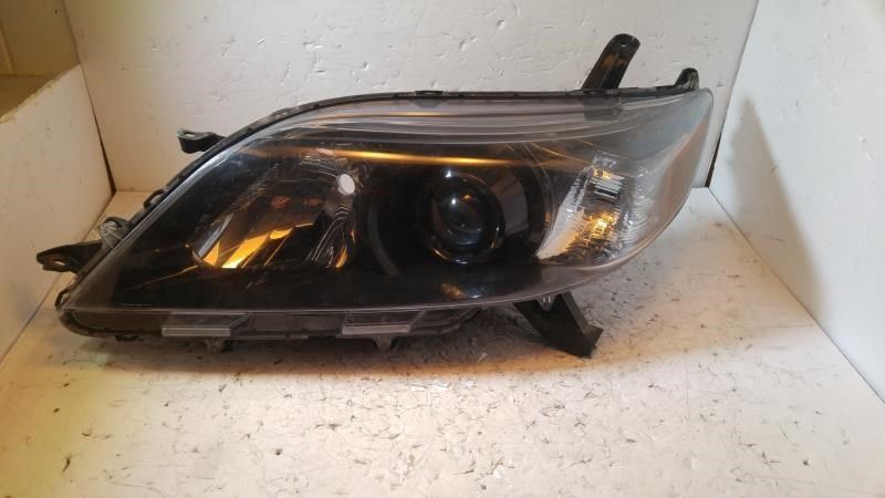 Left headlamp assembly composite used genuine OEM Toyota Sienna 2015-2019