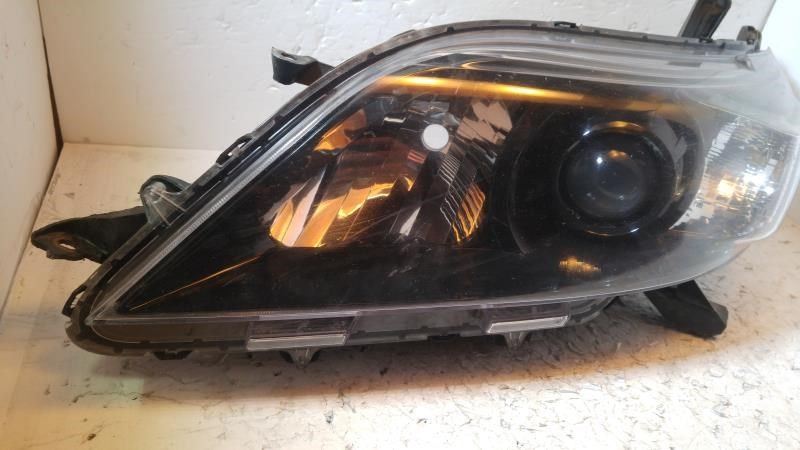 Left headlamp assembly composite used genuine OEM Toyota Sienna 2015-2019