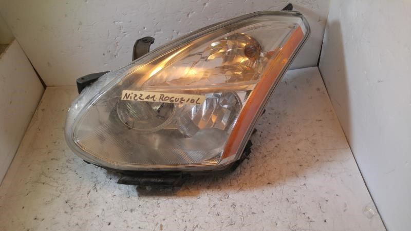 Left headlamp assembly composite used genuine OEM Nissan Rogue 2009-2010
