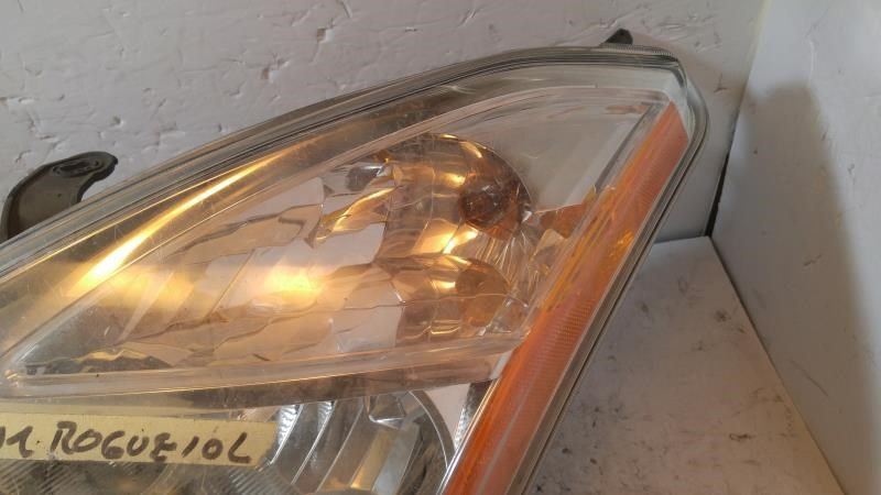 Left headlamp assembly composite used genuine OEM Nissan Rogue 2009-2010