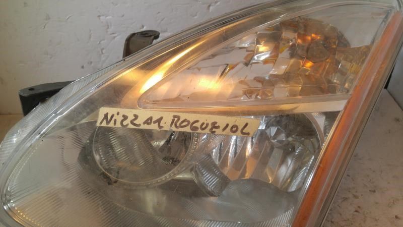 Left headlamp assembly composite used genuine OEM Nissan Rogue 2009-2010