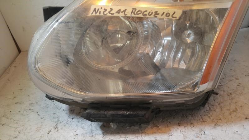 Left headlamp assembly composite used genuine OEM Nissan Rogue 2009-2010