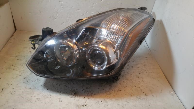 Left headlamp assembly composite used genuine OEM Nissan Altima 2010-2013