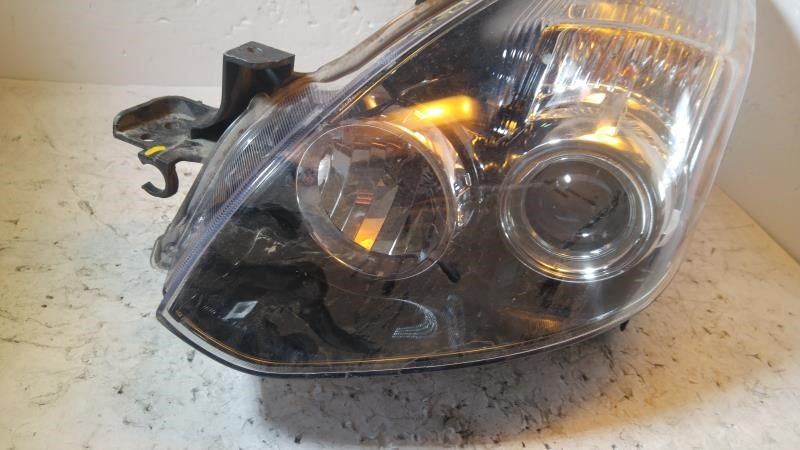 Left headlamp assembly composite used genuine OEM Nissan Altima 2010-2013