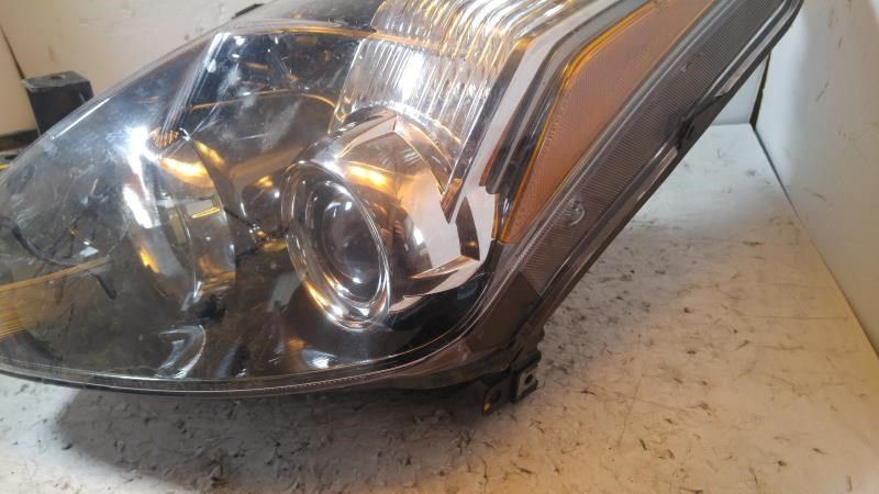 Left headlamp assembly composite used genuine OEM Nissan Altima 2010-2013