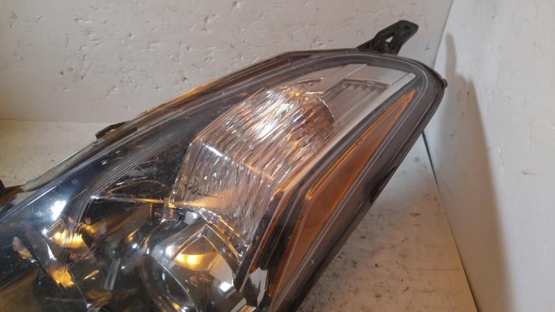Left headlamp assembly composite used genuine OEM Nissan Altima 2010-2013