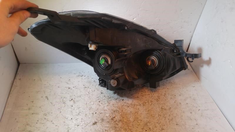 Left headlamp assembly composite used genuine OEM Nissan Altima 2010-2013
