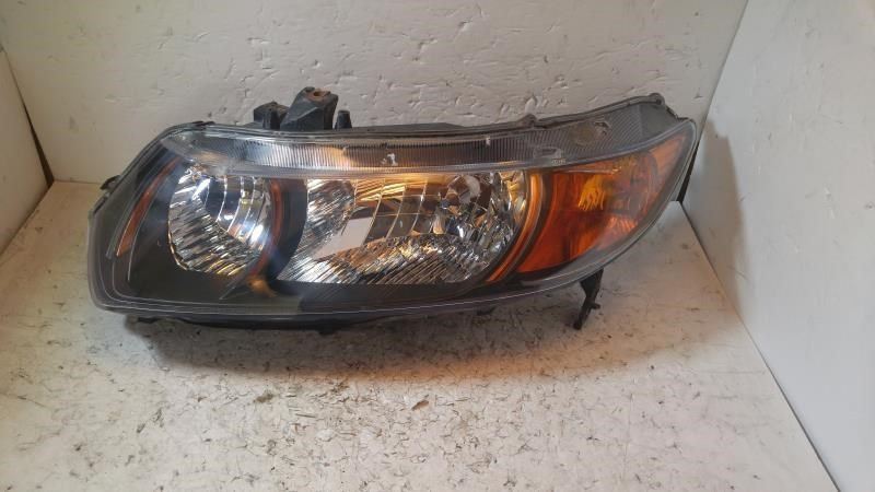 Left headlamp lens/housing used genuine OEM Honda Civic 2010-2011