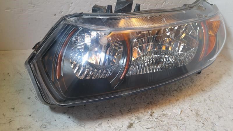 Left headlamp lens/housing used genuine OEM Honda Civic 2010-2011