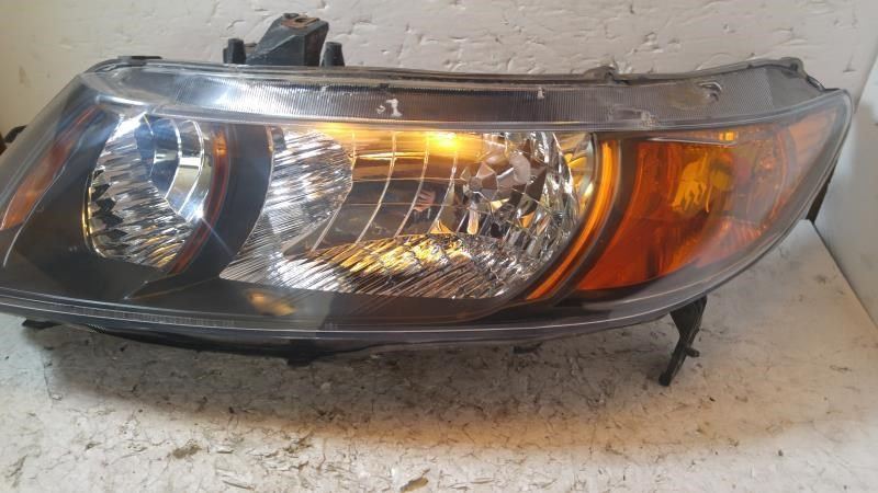 Left headlamp lens/housing used genuine OEM Honda Civic 2010-2011