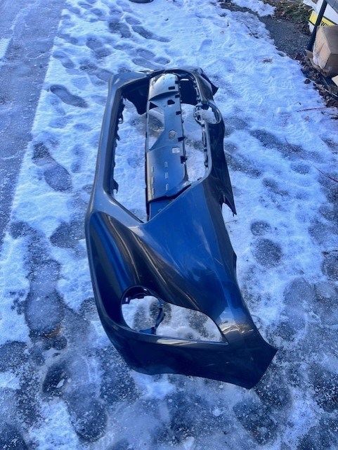 Front bumper cover used genuine OEM Toyota Prius C 2015-2016