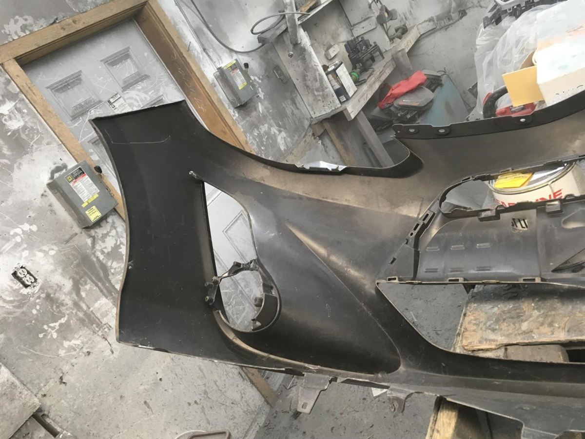 Front bumper cover used genuine OEM Toyota Prius C 2015-2016