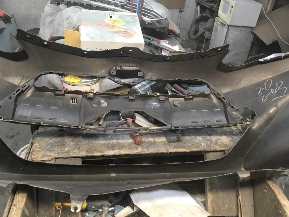 Front bumper cover used genuine OEM Toyota Prius C 2015-2016
