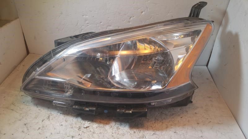 Left headlamp assembly composite used genuine OEM Nissan Sentra 2013-2015