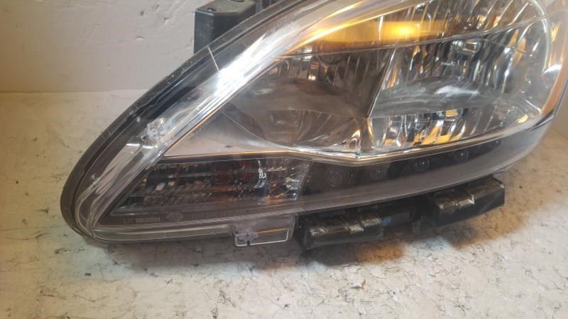 Left headlamp assembly composite used genuine OEM Nissan Sentra 2013-2015