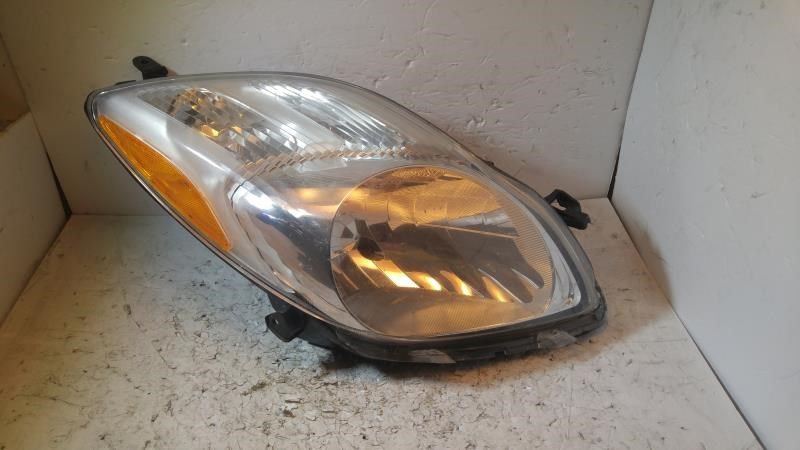 Right headlamp assembly composite used genuine OEM Toyota Yaris 2006-2008
