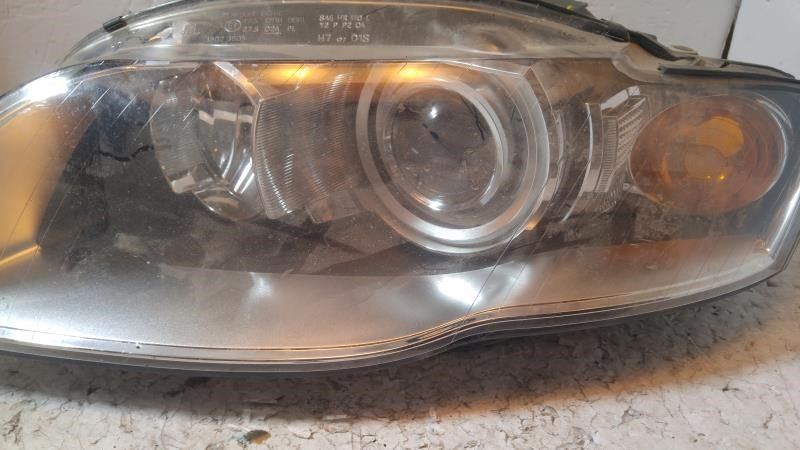 Left headlamp assembly composite used genuine OEM Audi A4 2005-2009