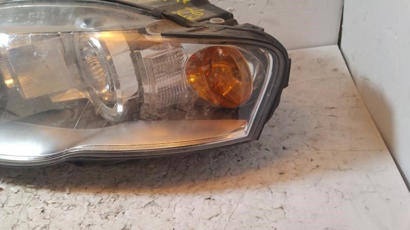 Left headlamp assembly composite used genuine OEM Audi A4 2005-2009