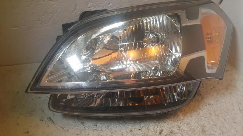 Left headlamp assembly composite used genuine OEM KIA Soul 2010-2011