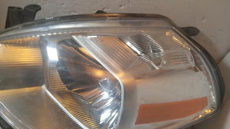 Faro izquierdo usado original (OEM) Nissan Versa 2007-2012