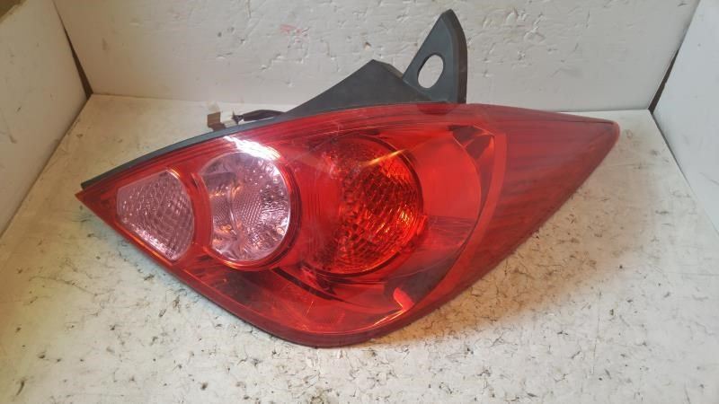 Right taillamp assembly used genuine OEM Nissan Versa 2007-2012