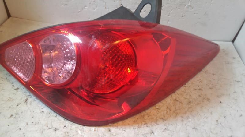 Right taillamp assembly used genuine OEM Nissan Versa 2007-2012
