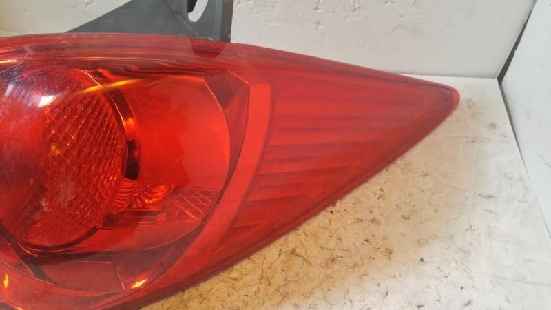 Right taillamp assembly used genuine OEM Nissan Versa 2007-2012
