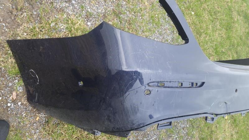 Rear bumper cover used genuine OEM Mercedes-Benz E350 2021-2022
