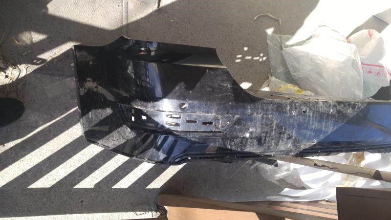 Rear bumper cover used genuine OEM
