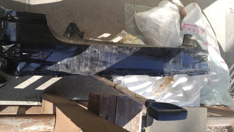 Rear bumper cover used genuine OEM