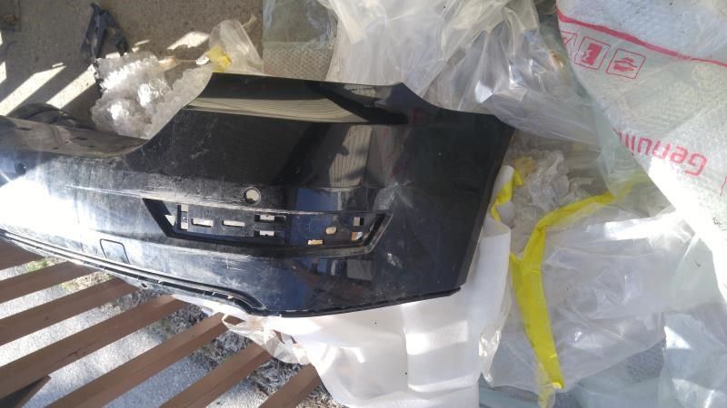 Rear bumper cover used genuine OEM